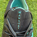 UNDER ARMOUR SHADOW ELITE 3.0 FG MANSORY - MARÉE TROPICALE/NOIR ÉDITION LIMITÉE